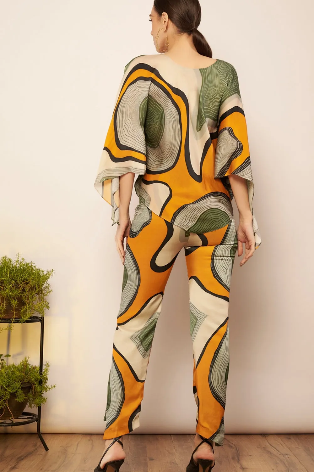 Asymmetrical hem pants.