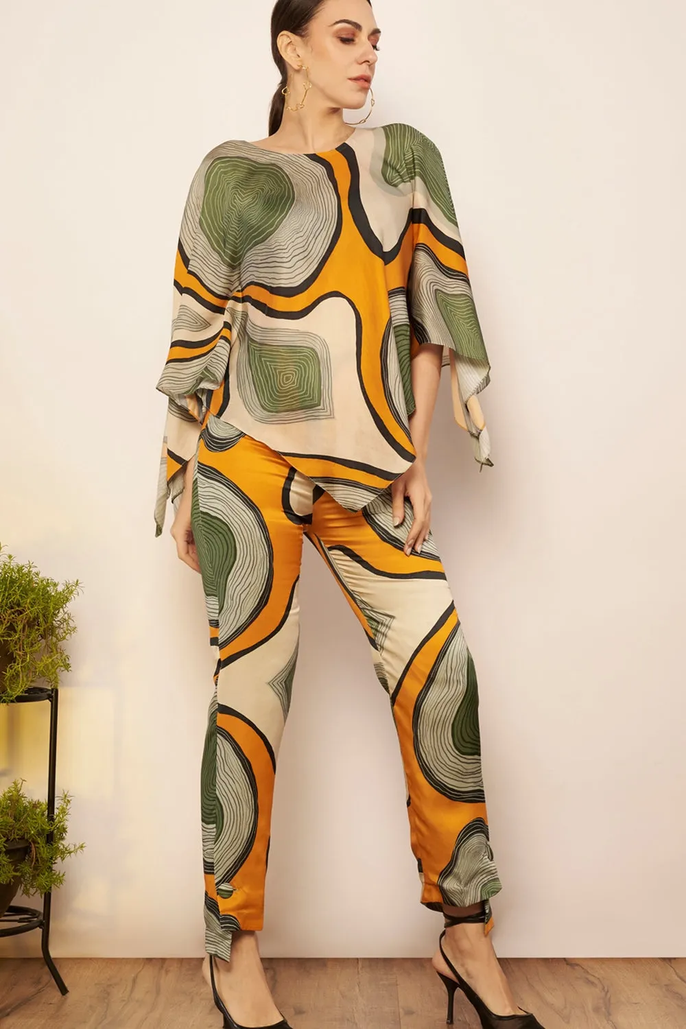 Asymmetrical hem pants.
