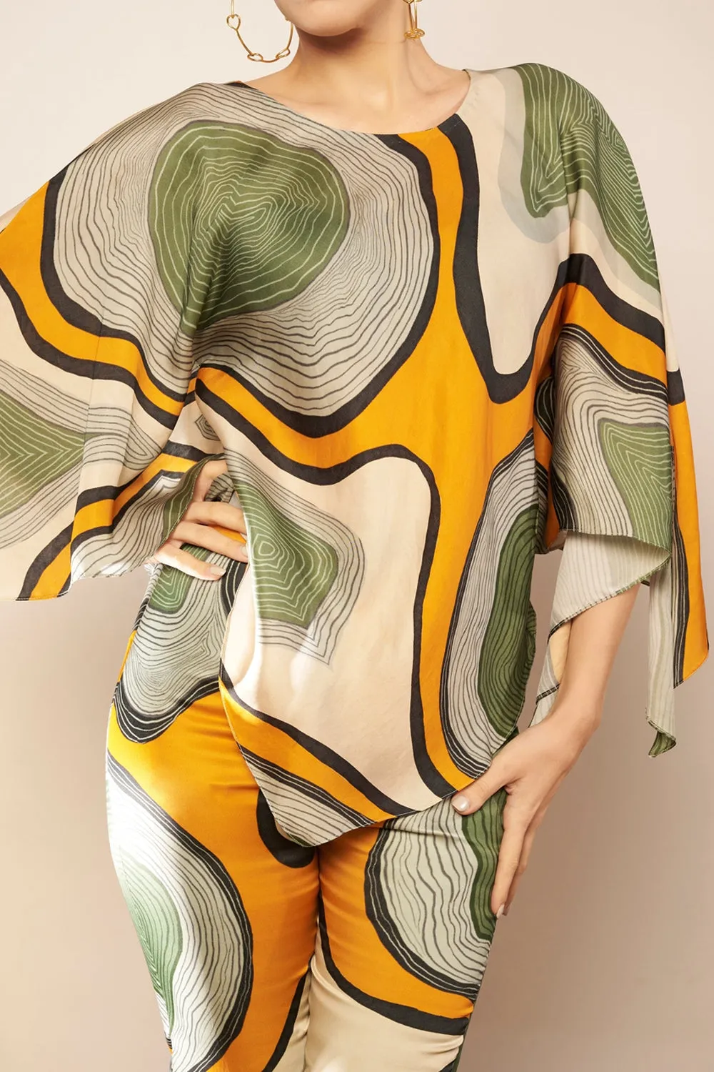Asymmetrical hem pants.